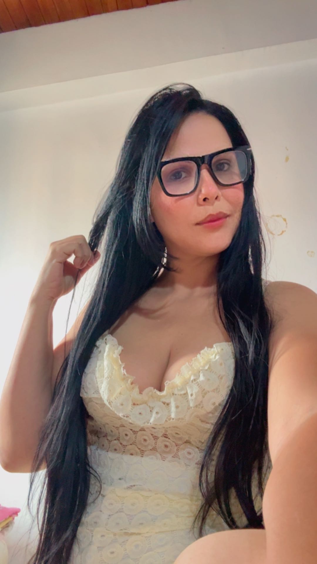 Adult woman getting ready for a flirty video conversation